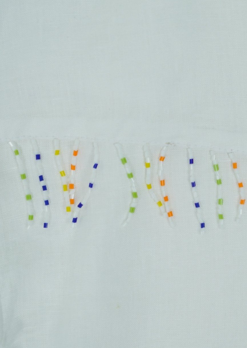 White Ulu with Multi Colored Fringe